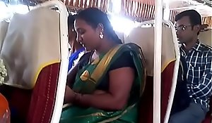 Aunty respecting bus.. blouse teat visible... Watch carefully 1