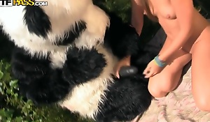 Panda's huge strapon dildo made the girl aroused too, and she got down to swell up it. Then she let the panda burgeoning her with that brutal dildo. Oh, this hot sex play is a must-see!