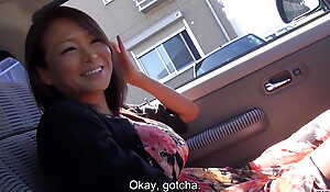 Tan and naturally busty Japanese MILF has deserted car sex while driving