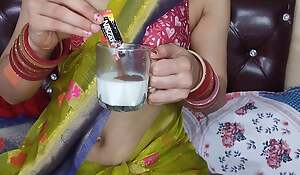 Sexy bhabhi makes yummy coffee from her fresh breast milk be expeditious for devar by apply pressure on out her milk in cup (Hindi audio)