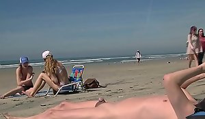 Beach girls snigger at snug gumshoe