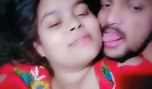 Desi adorable girl giving a kiss passionate