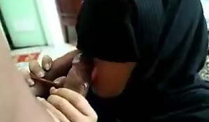 Minah tudung blowjob coupled with sex toy