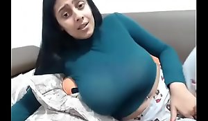 Hot girl encircling amazing tits masturbating on webcam